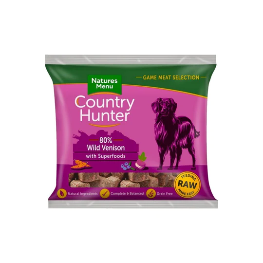 Indulge your canine companion with delectable meaty nuggets crafted from a remarkable 80% grass-fed beef blend, harmoniously combined with a nutritious array of wholesome superfoods. These nuggets offer a complete and balanced meal, free of chicken and grains, conveniently packaged in 1kg portions, providing approximately 58 nuggets per pack. Give your dog the gift of a premium, raw beef feast that redefines the standards for canine cuisine. At Natures Menu, we uphold the highest quality, sourcing only human-grade, responsibly obtained meats. Our grass-fed beef raw dog food nuggets feature an impressive 80% beef content, alongside a nourishing fusion of fruits and vegetables that embody the essence of superfoods, ensuring your dog enjoys a meal worth barking about! These single-protein, easily servable raw dog food nuggets are enhanced with the goodness of carrots, swede, and blackberries—canine superfoods—delivering an added dose of vitamins C and K, as well as extra dietary fiber. Completely devoid of bones, our formula contains no artificial colors or preservatives. Country Hunter Grass-Fed Beef Nuggets offer a seamless transition to a raw diet for your dog, simply portion out the required number of nuggets, thaw, and serve. They are gentle on your dog's digestive system, making them an ideal choice for dogs with allergies or sensitive stomachs. Rest easy knowing that all our complete and balanced dog meals adhere to FEDIAF guidelines and have received veterinary approval. COUNTRY HUNTER RAW NUGGETS WILD VENISON FOR ADULT DOGS 1kg frozen